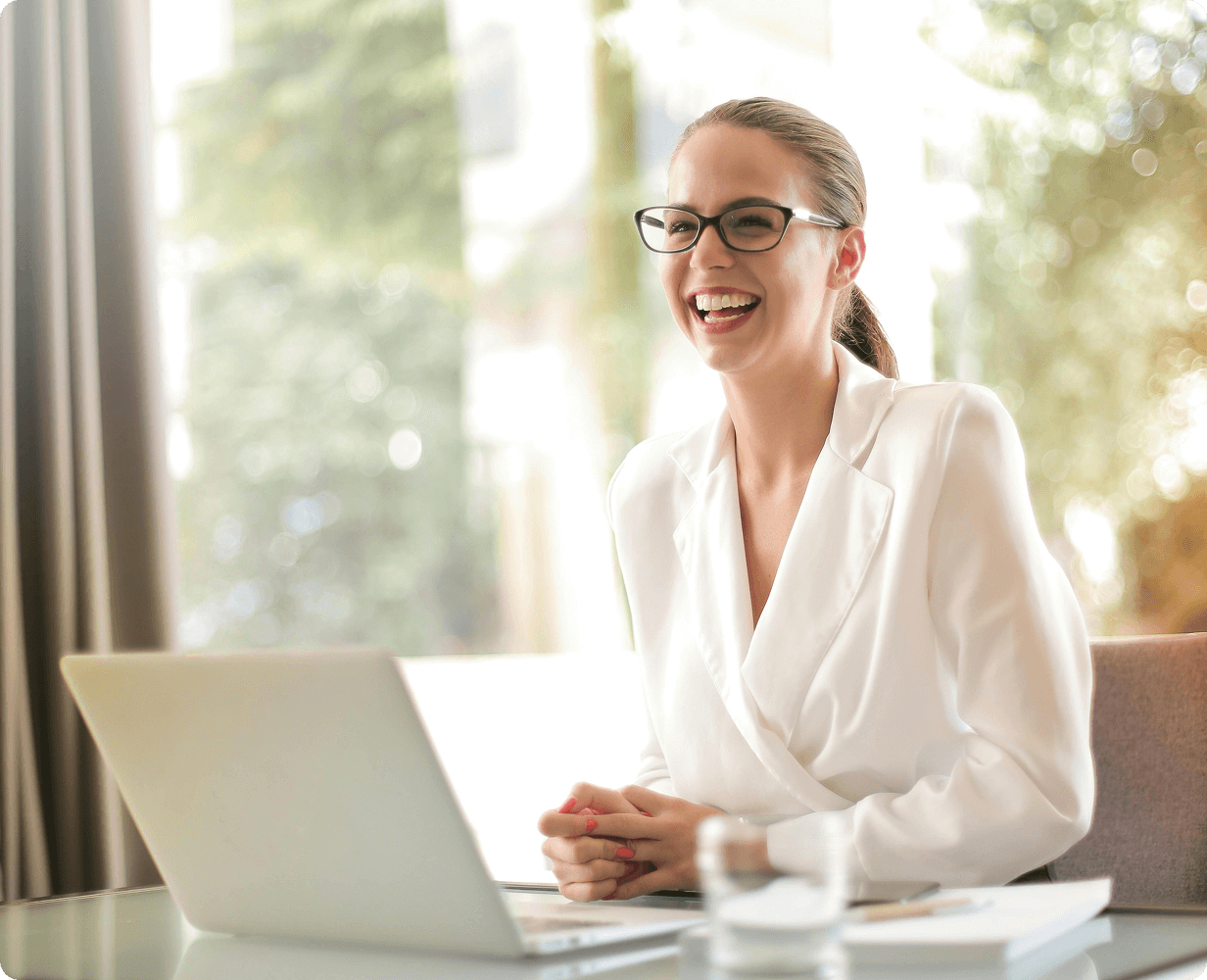Image of a lady smiling in the office